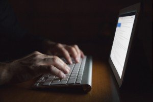 o-using-computer-in-dark-facebook